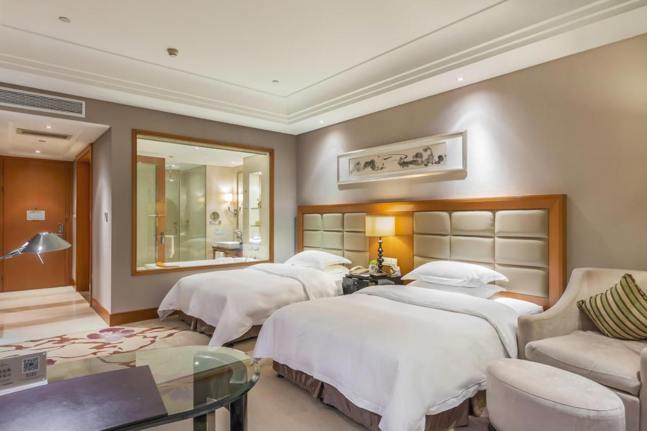 Hotel Wyndham Xinyang Downtown Esterno foto