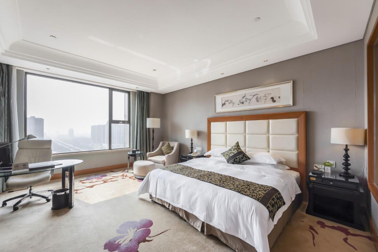 Hotel Wyndham Xinyang Downtown Esterno foto