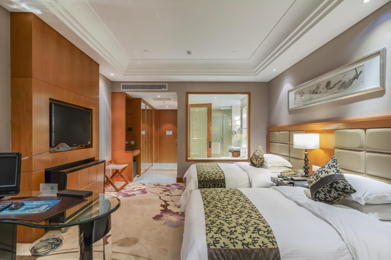 Hotel Wyndham Xinyang Downtown Esterno foto
