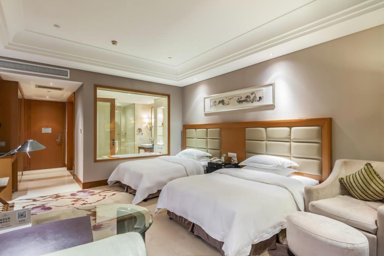 Hotel Wyndham Xinyang Downtown Esterno foto