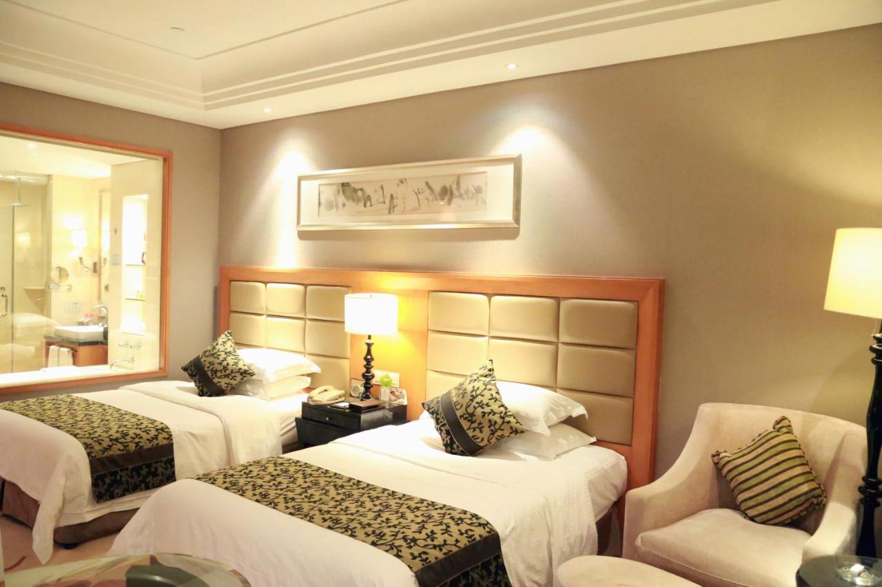 Hotel Wyndham Xinyang Downtown Esterno foto