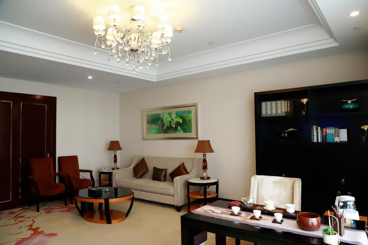 Hotel Wyndham Xinyang Downtown Esterno foto