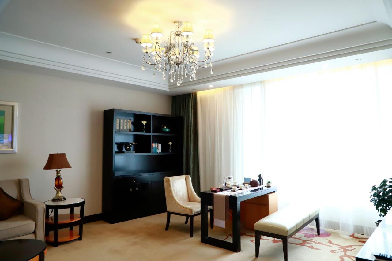 Hotel Wyndham Xinyang Downtown Esterno foto