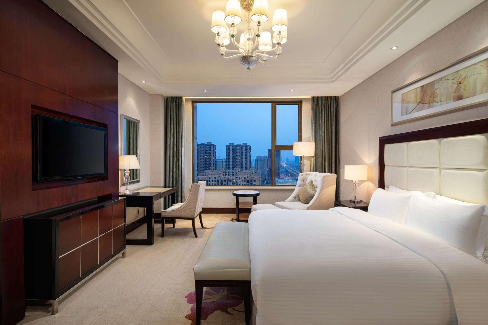Hotel Wyndham Xinyang Downtown Esterno foto