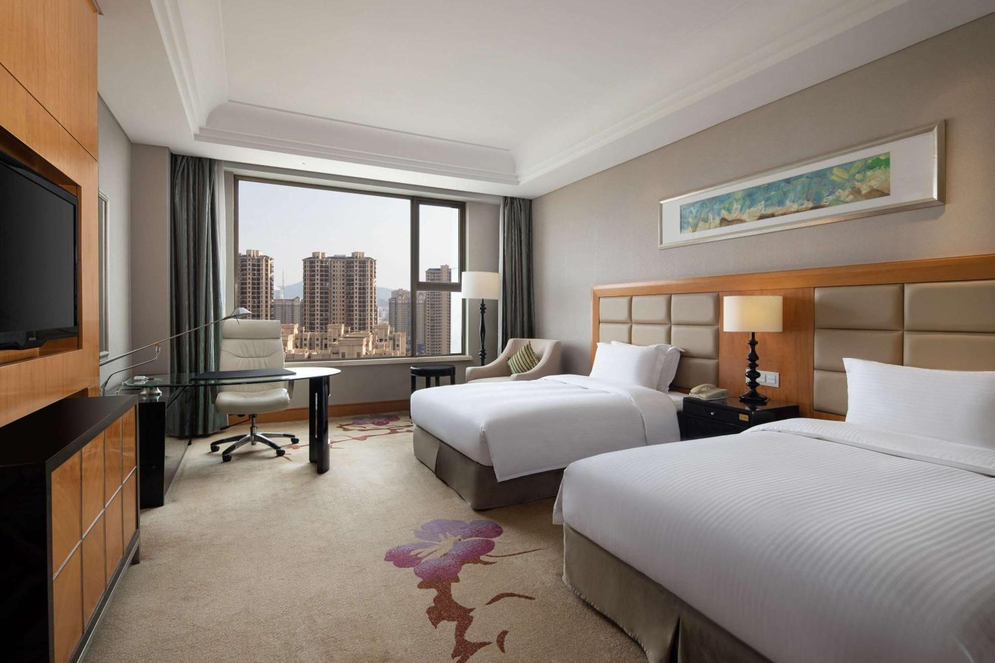 Hotel Wyndham Xinyang Downtown Esterno foto
